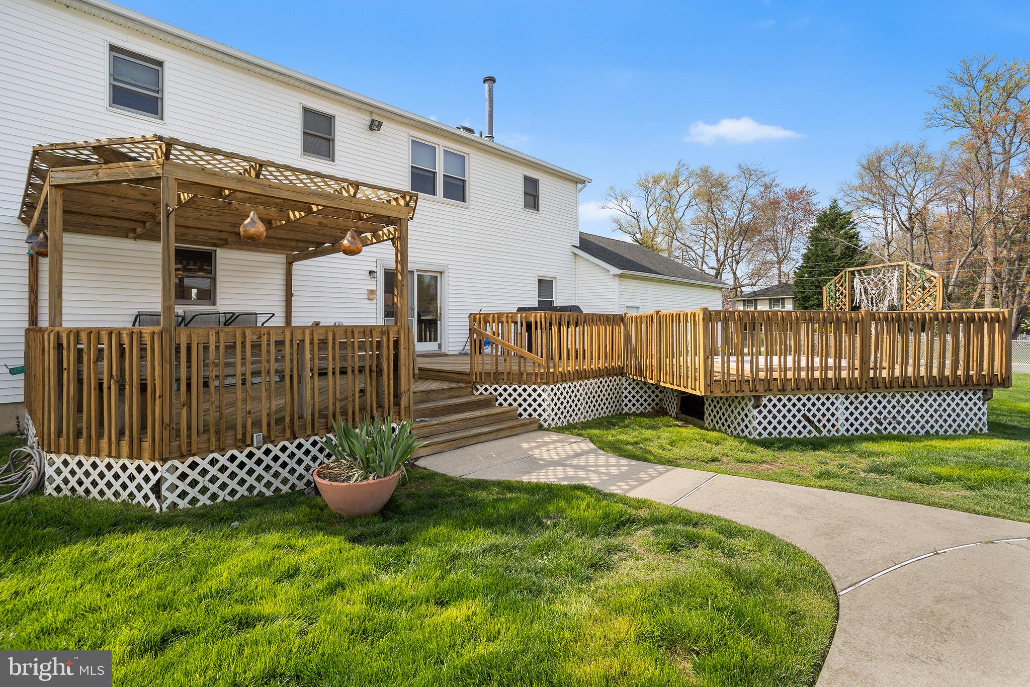 200 Casperson Street Gibbstown, NJ 08027 - Photo 51 of 64 a front view of a house with a garden