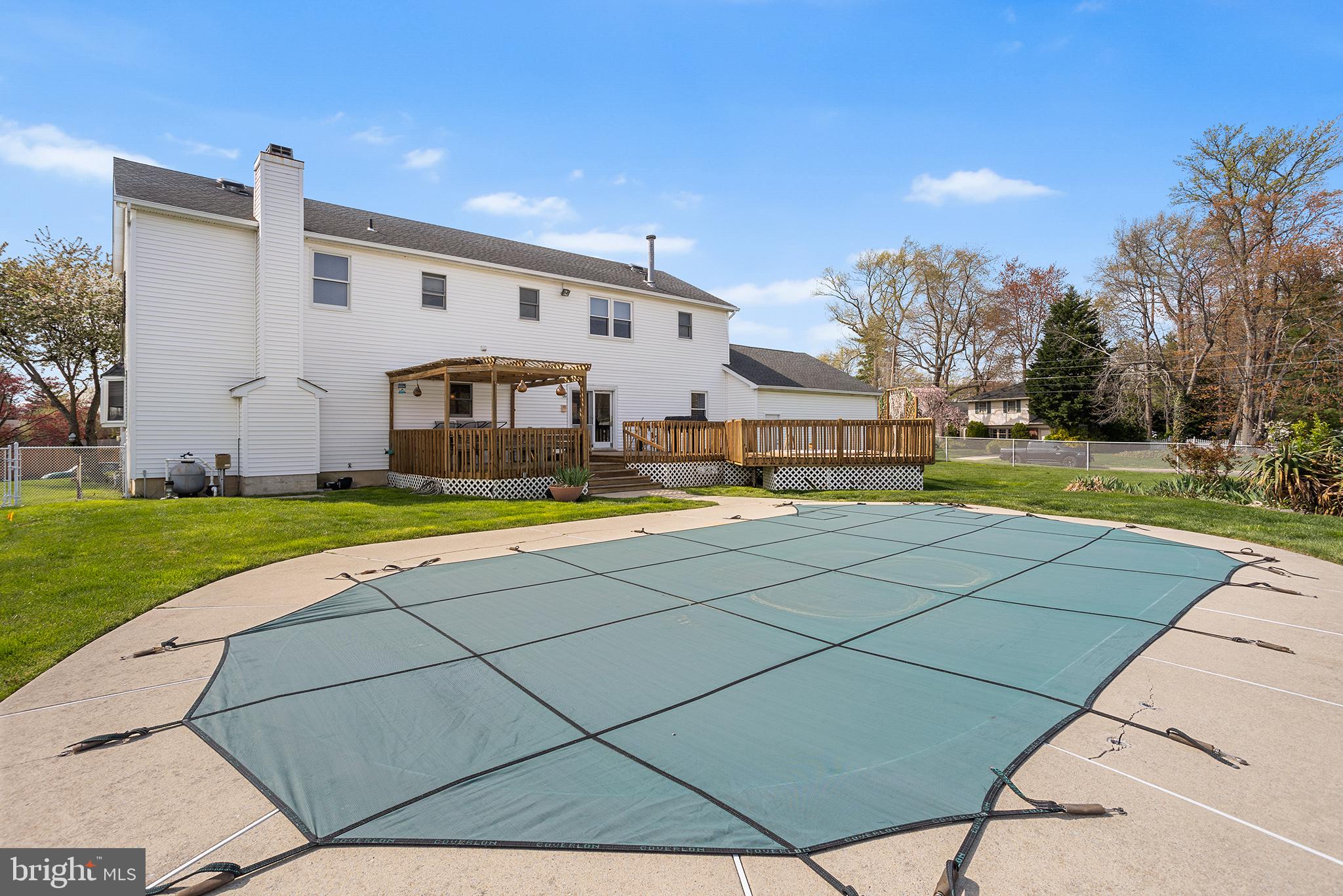 200 Casperson Street Gibbstown, NJ 08027 - Photo 61 of 64 a view of swimming pool with outdoor seating and house in the background