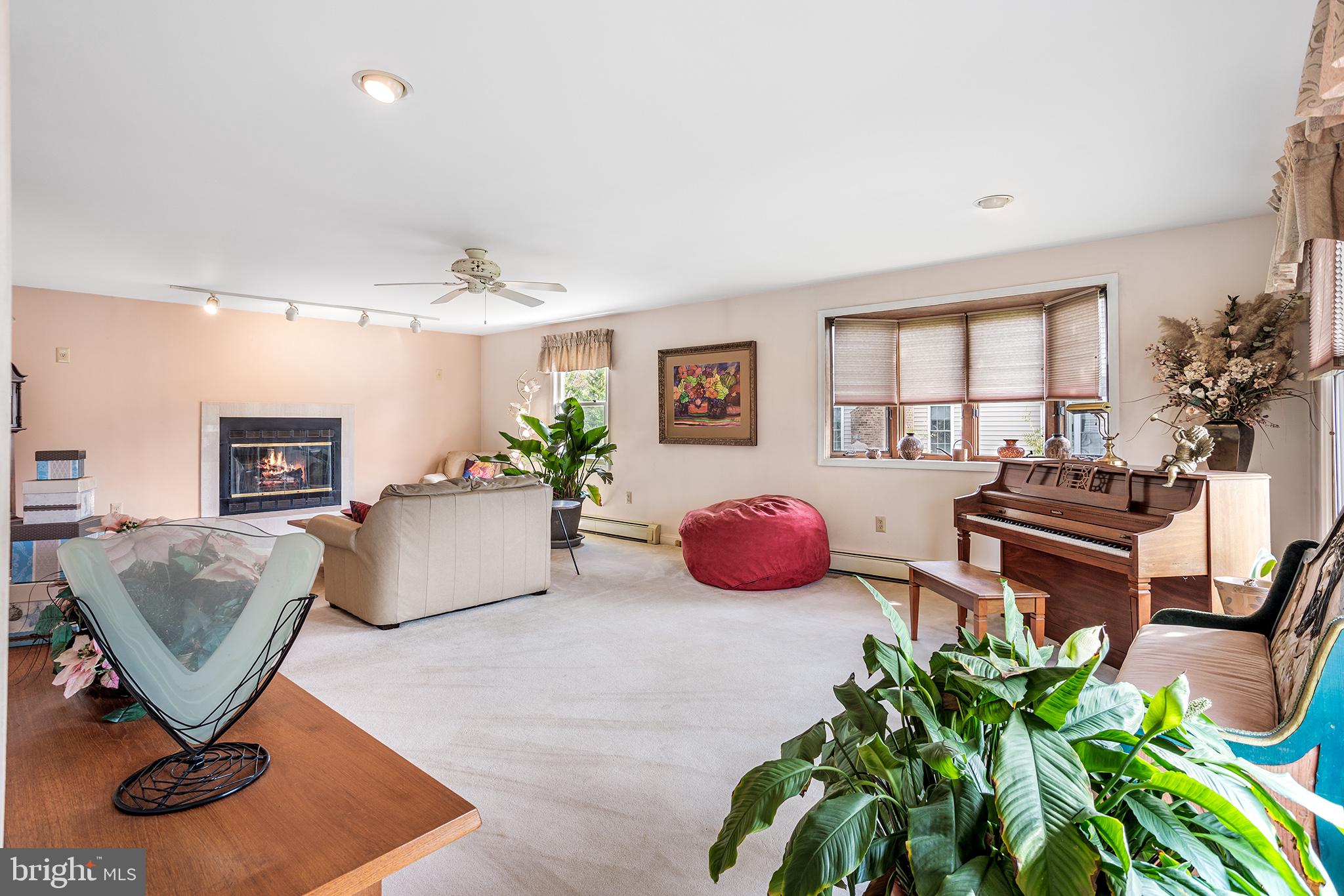 200 Casperson Street Gibbstown, NJ 08027 - Photo 7 of 64 a living room with furniture a window and a potted plant