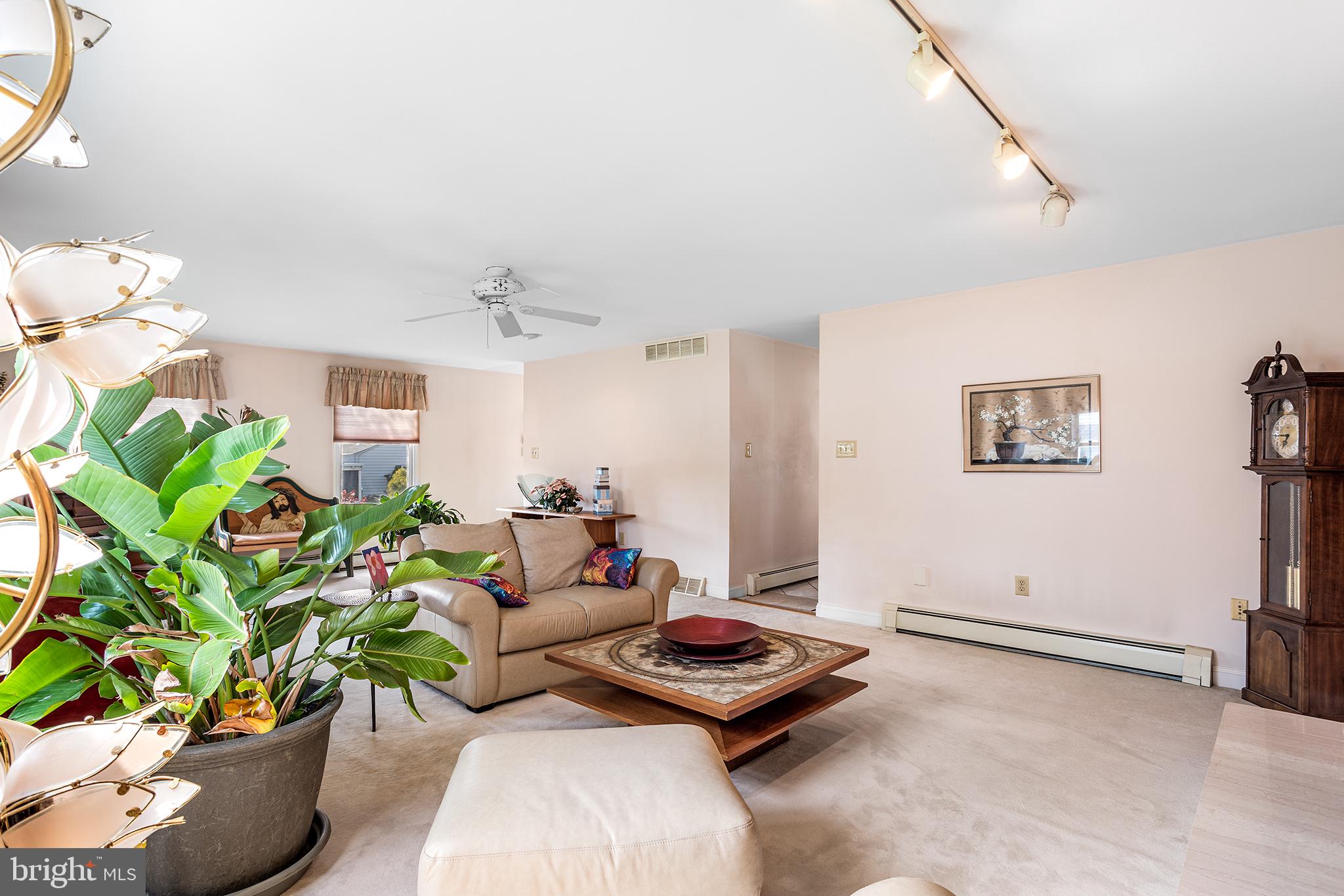 200 Casperson Street Gibbstown, NJ 08027 - Photo 8 of 64 a living room with furniture plant and a potted plant