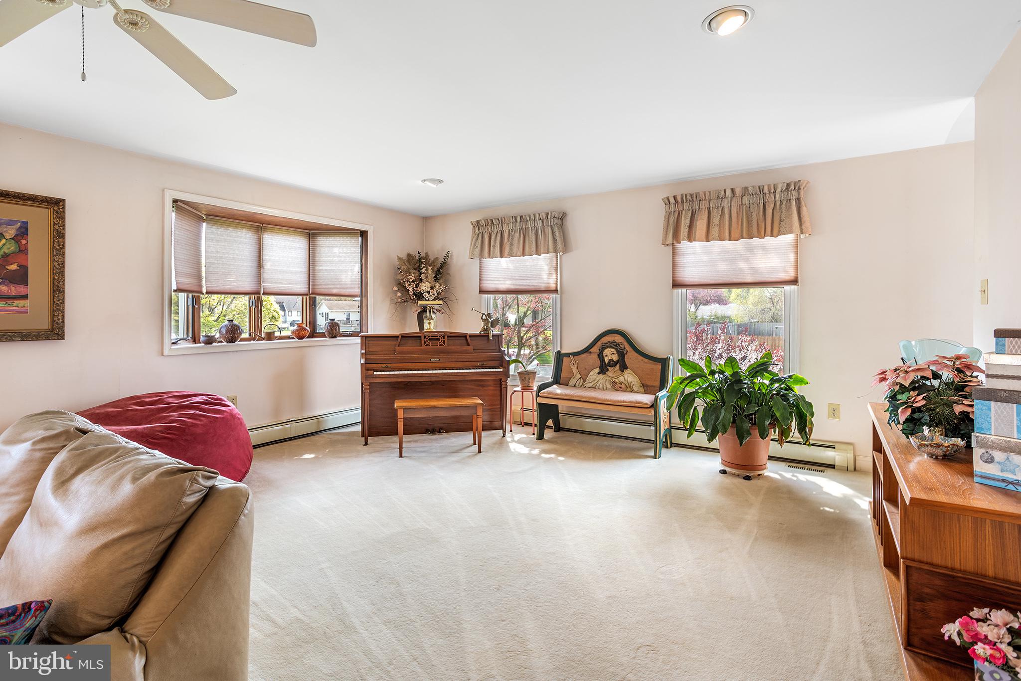 200 Casperson Street Gibbstown, NJ 08027 - Photo 9 of 64 a living room with furniture and a potted plant
