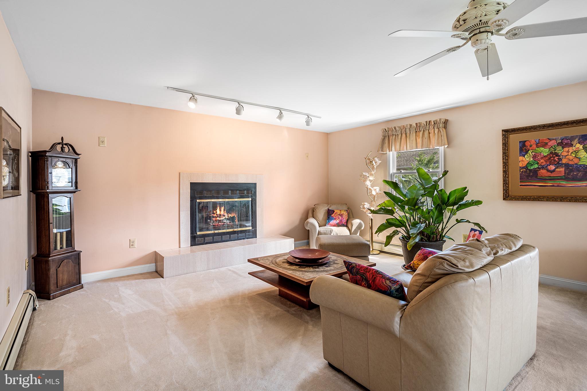 200 Casperson Street Gibbstown, NJ 08027 - Photo 10 of 64 a living room with furniture and a potted plant