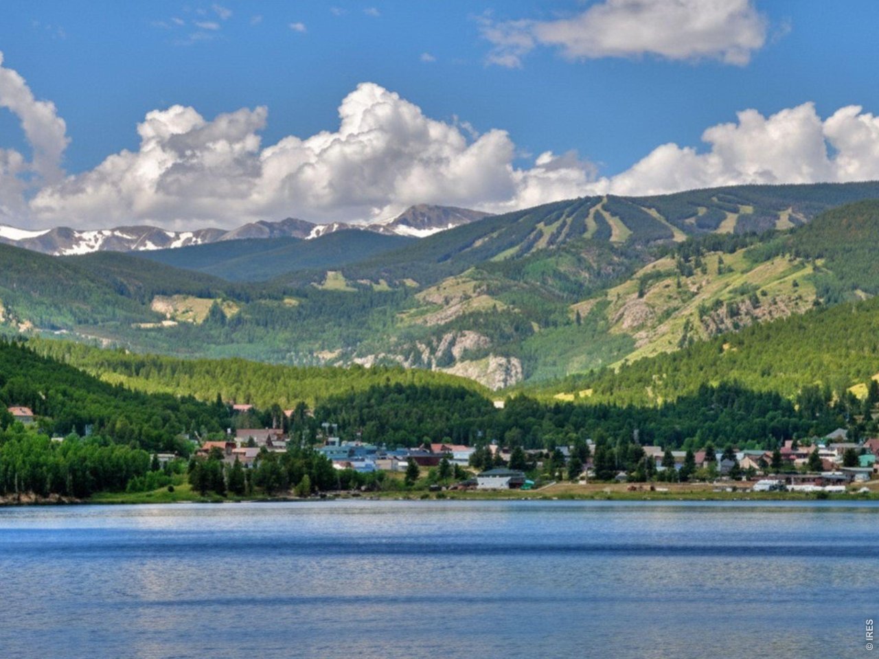 131 West Boulder Street Nederland, CO 80466 - Photo 46 of 46 Aerial view of nearby snow- capped mountains, lake, and blue sky.
