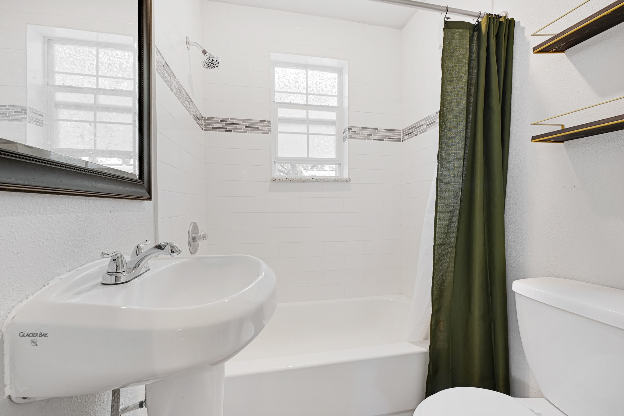 207 Wafer Street Pasadena, TX 77506 - Photo 22 of 26 a bathroom with a sink toilet and shower