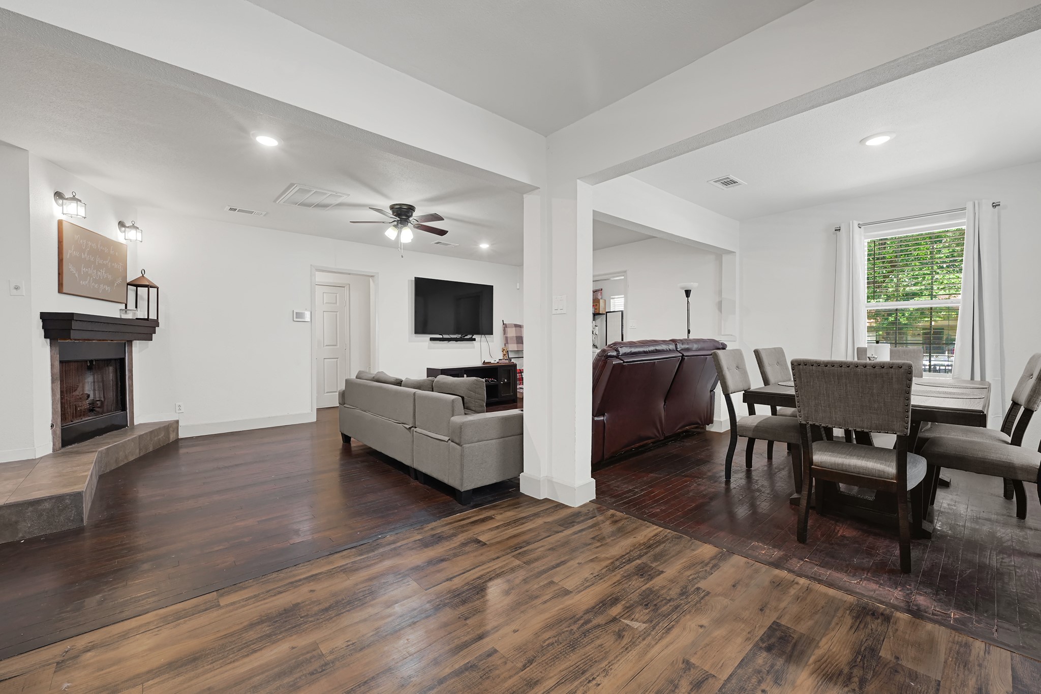 207 Wafer Street Pasadena, TX 77506 - Photo 6 of 26 a living room with furniture flat screen tv and fireplace