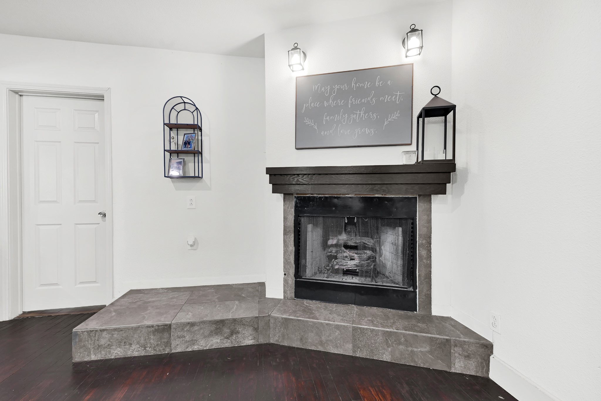207 Wafer Street Pasadena, TX 77506 - Photo 9 of 26 a living room with furniture and a fireplace