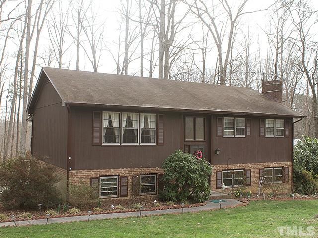 5522 Earl Road Durham, NC 27712 - Photo 1 of 13 front view of house with a yard