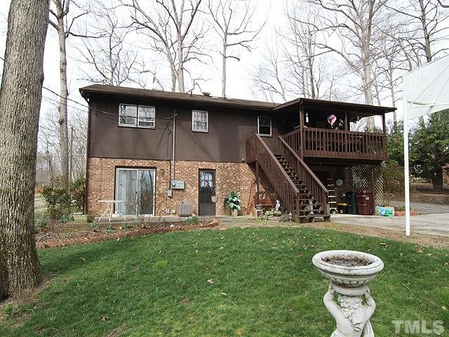 5522 Earl Road Durham, NC 27712 - Photo 13 of 13 a front view of a house with garden