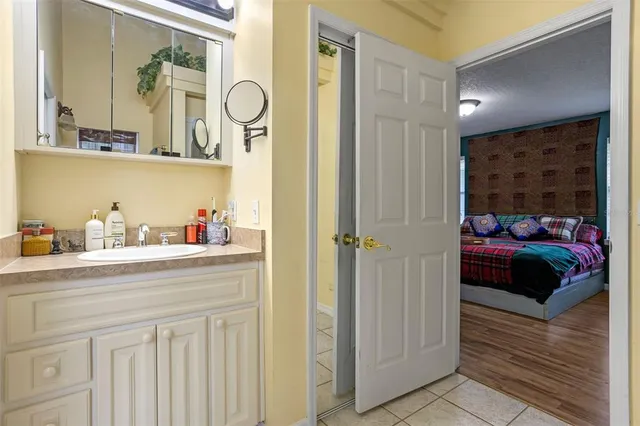 a view of a room with wooden floor staircase and windows