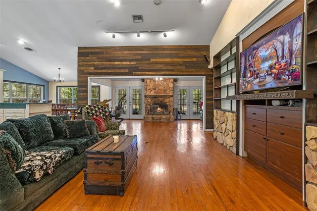 a kitchen with lots of counter top space and dining table