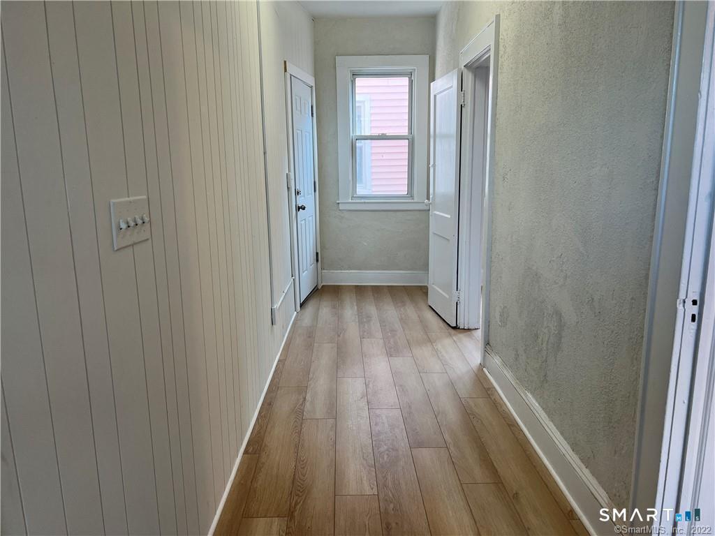 109 Post Road, Unit A Fairfield, CT 06824 - Photo 13 of 13 Large Mudroom/Bonus area