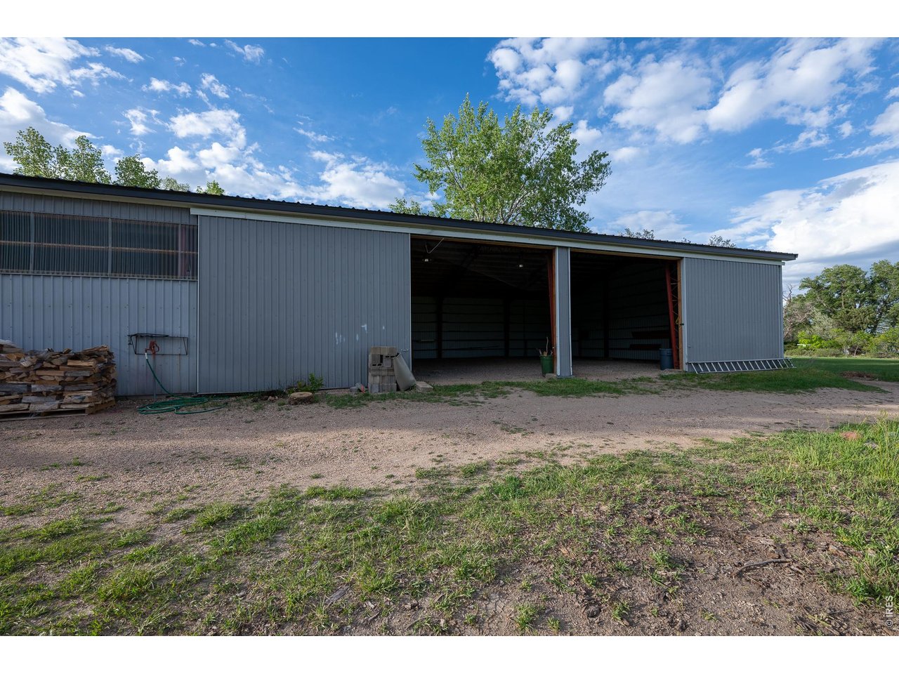 4099 Michaud Lane Fort Collins, CO 80521 - Photo 46 of 50 This metal barn/shop offers endless possibilities, with two finished bays and 3 bays open waiting for your vision and customization.