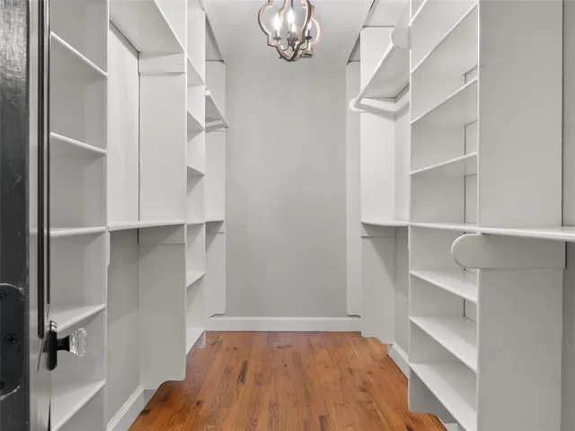 a view of empty room with empty racks