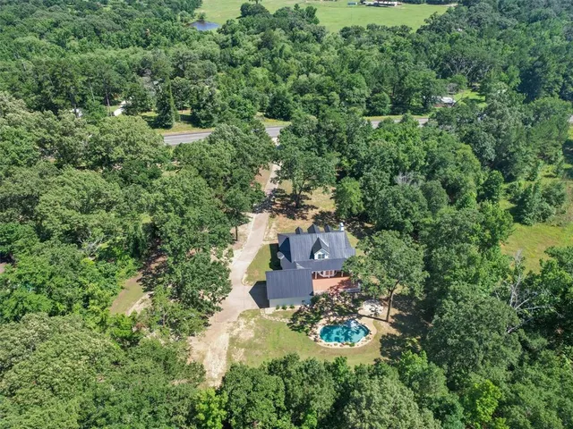 a front view of a house with swimming pool