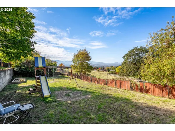 a view of a garden with a slide
