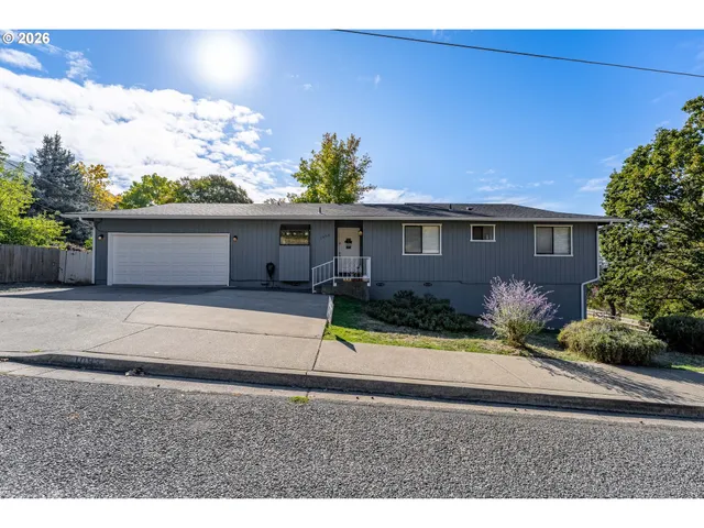 a picture of a bathroom with a shower