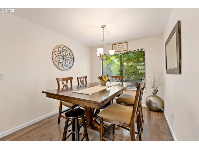 a view of a table and chairs in a room