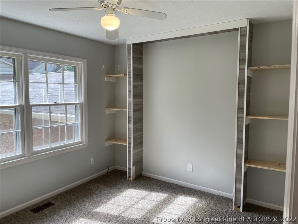 1714 Valley Ridge Drive Fayetteville, NC 28303 - Photo 19 of 32 a view of an empty room with a window