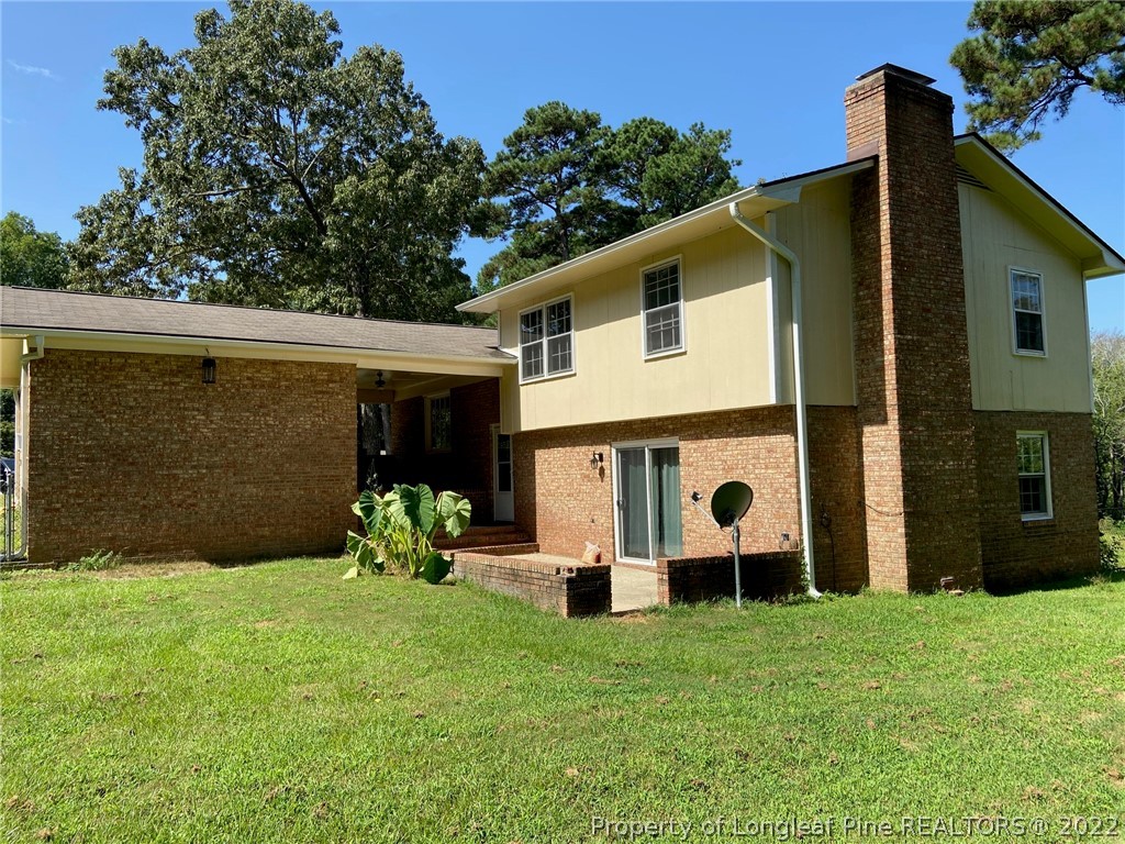 1714 Valley Ridge Drive Fayetteville, NC 28303 - Photo 29 of 32 a view of a house with backyard