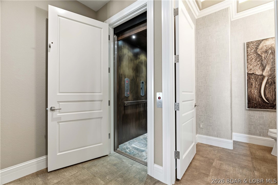 1015 Anemone Road Lake Ozark, MO 65049 - Photo 52 of 100 Lower Level Elevator