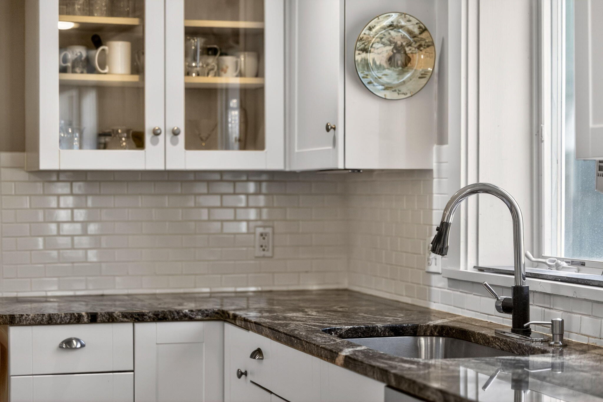 69 County Road Bourne, MA 02532 - Photo 11 of 54 a kitchen with granite countertop white cabinets and a stove