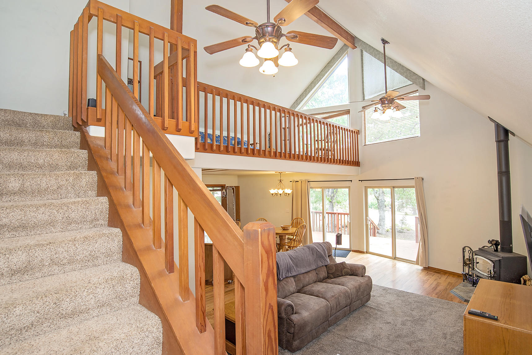 11754 Dixie Road White City, OR 97503 - Photo 11 of 38 a living room with wooden floor and furniture