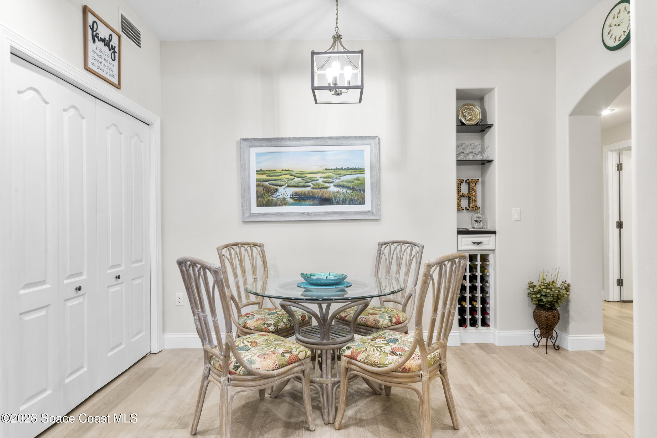 4955 Dixie Highway Northeast, Unit 702 Palm Bay, FL 32905 - Photo 16 of 54 a dining room with furniture and window