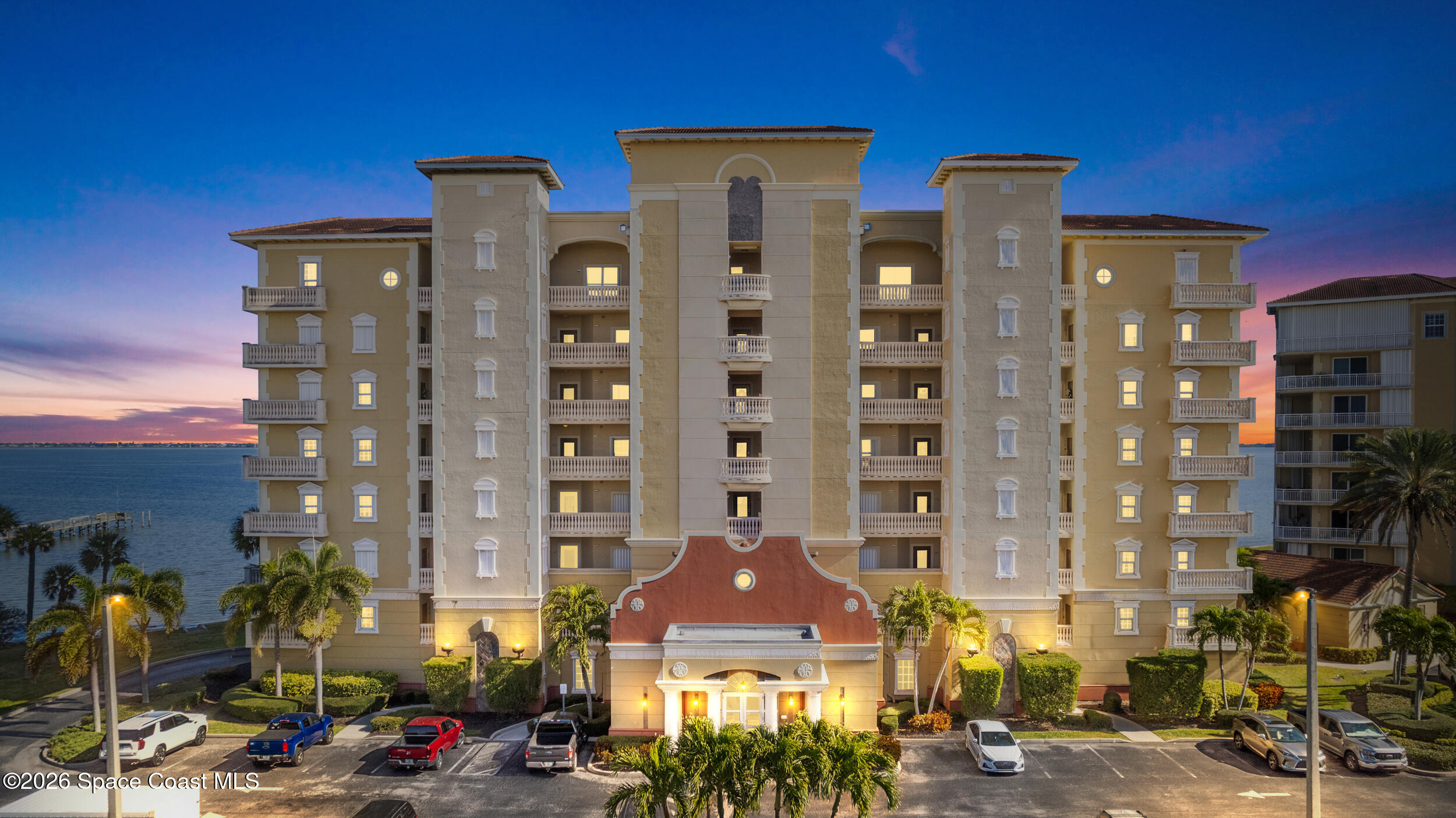 4955 Dixie Highway Northeast, Unit 702 Palm Bay, FL 32905 - Photo 2 of 54 a front view of a building with outdoor view