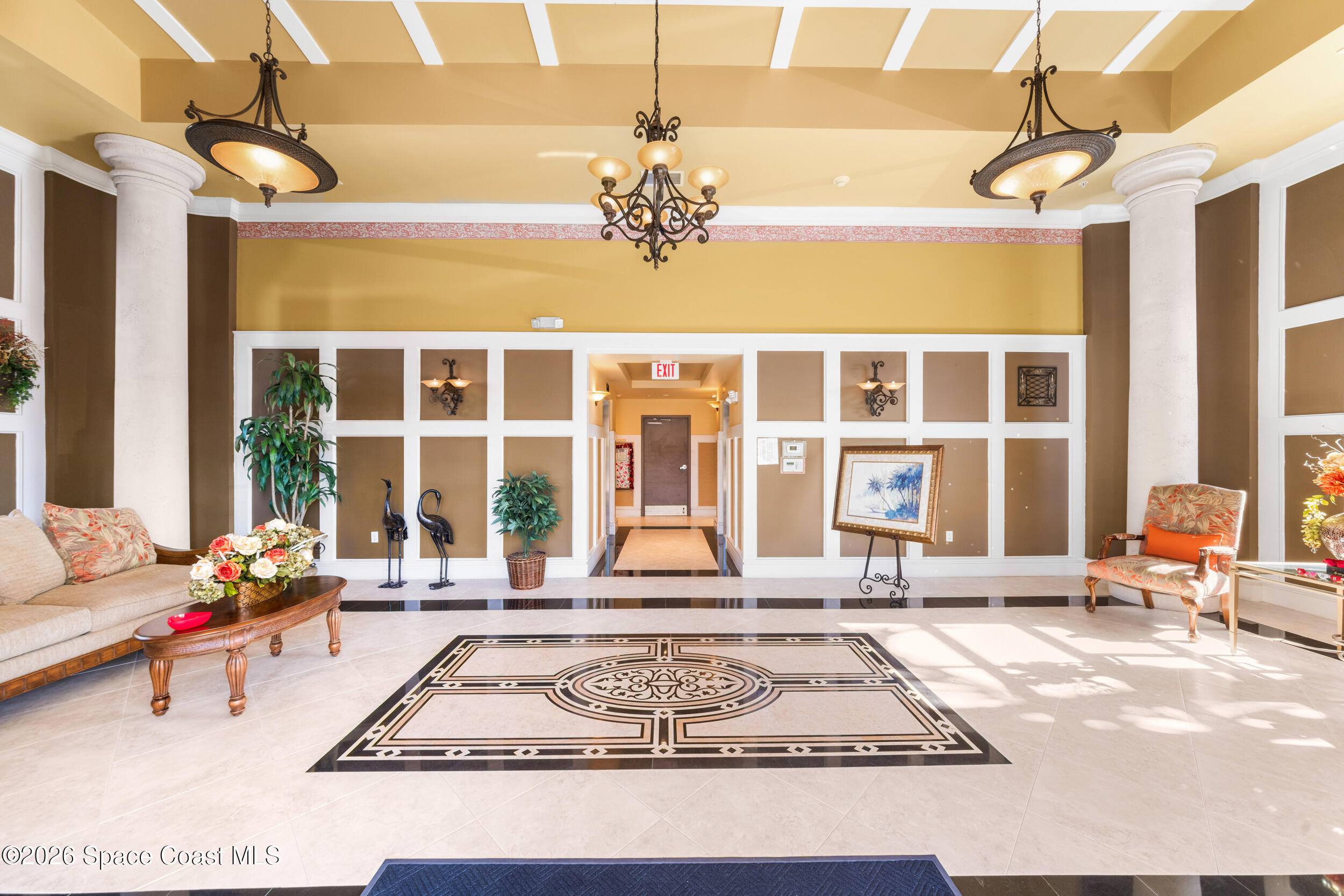 4955 Dixie Highway Northeast, Unit 702 Palm Bay, FL 32905 - Photo 47 of 54 a view of living room with a couch and dining table