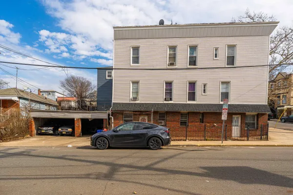 a car parked in front of a building