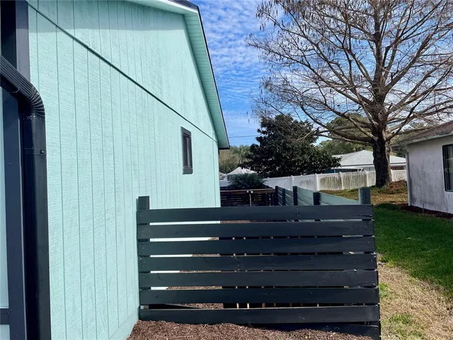 a view of a swimming pool with a lounge chairs