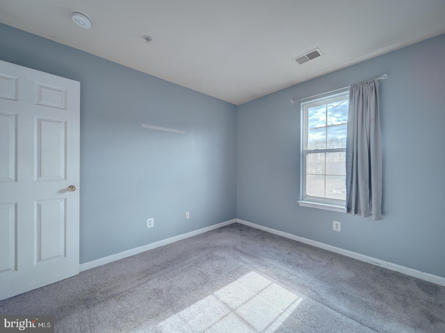 4016 Tidewood Road Baltimore, MD 21220 - Photo 25 of 40 a view of an empty room with a window