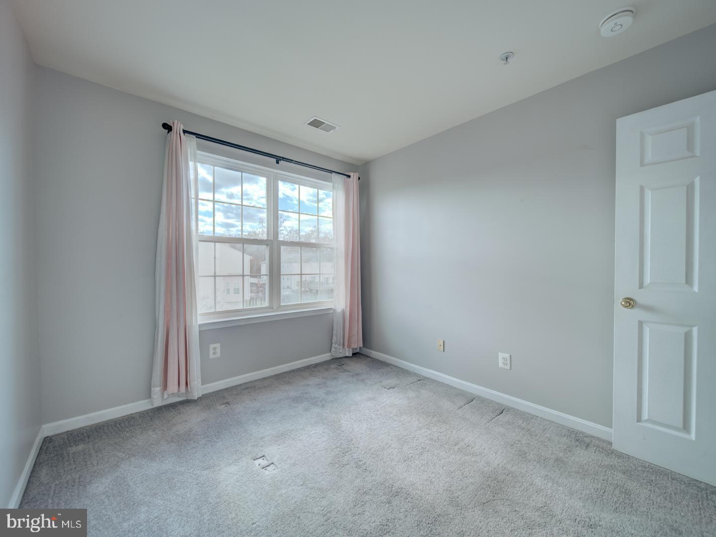 4016 Tidewood Road Baltimore, MD 21220 - Photo 27 of 40 an empty room with windows