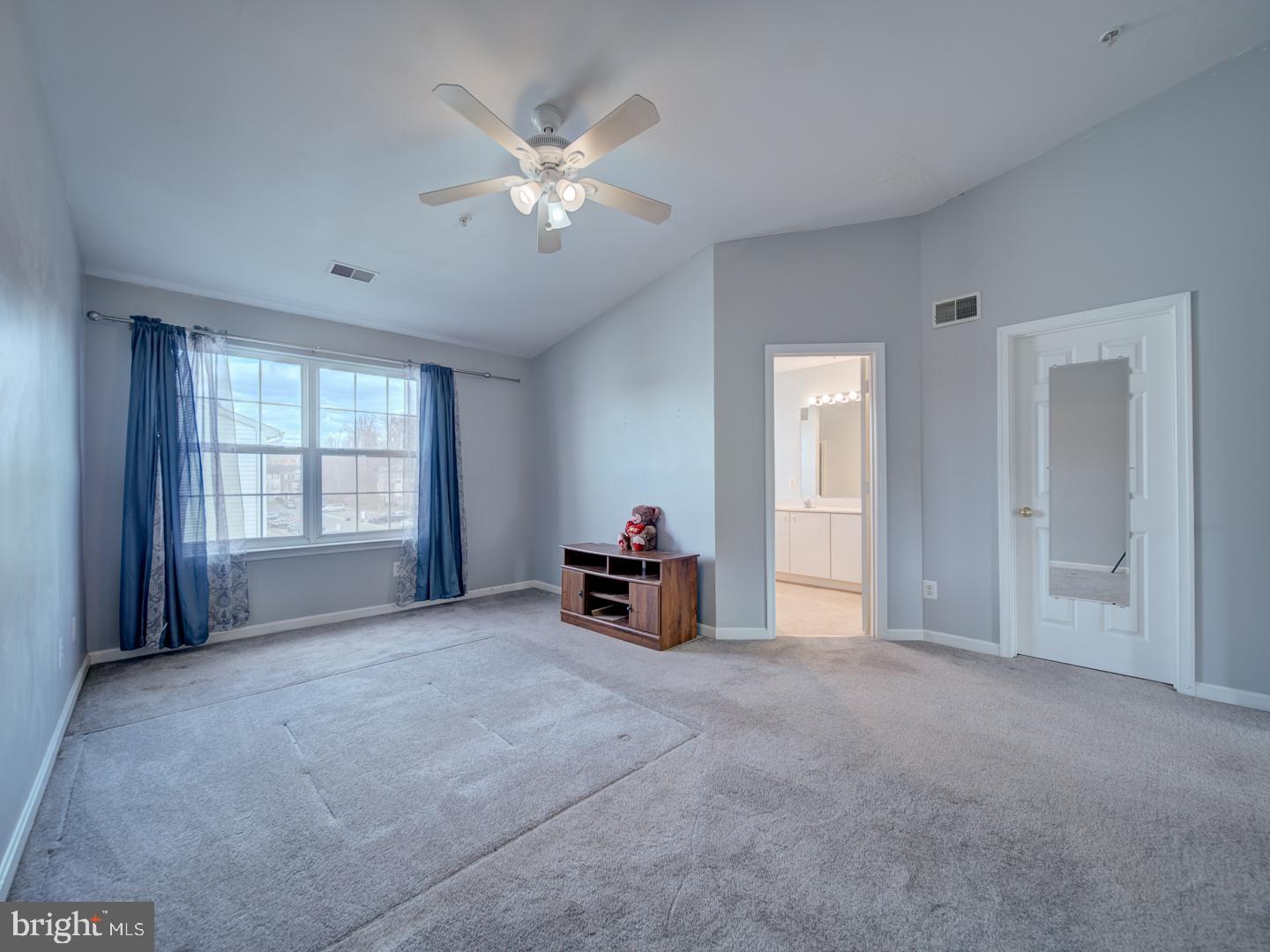 4016 Tidewood Road Baltimore, MD 21220 - Photo 30 of 40 a living room with furniture and a chandelier