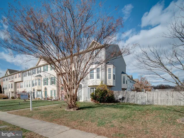 a view of a big yard next to a house