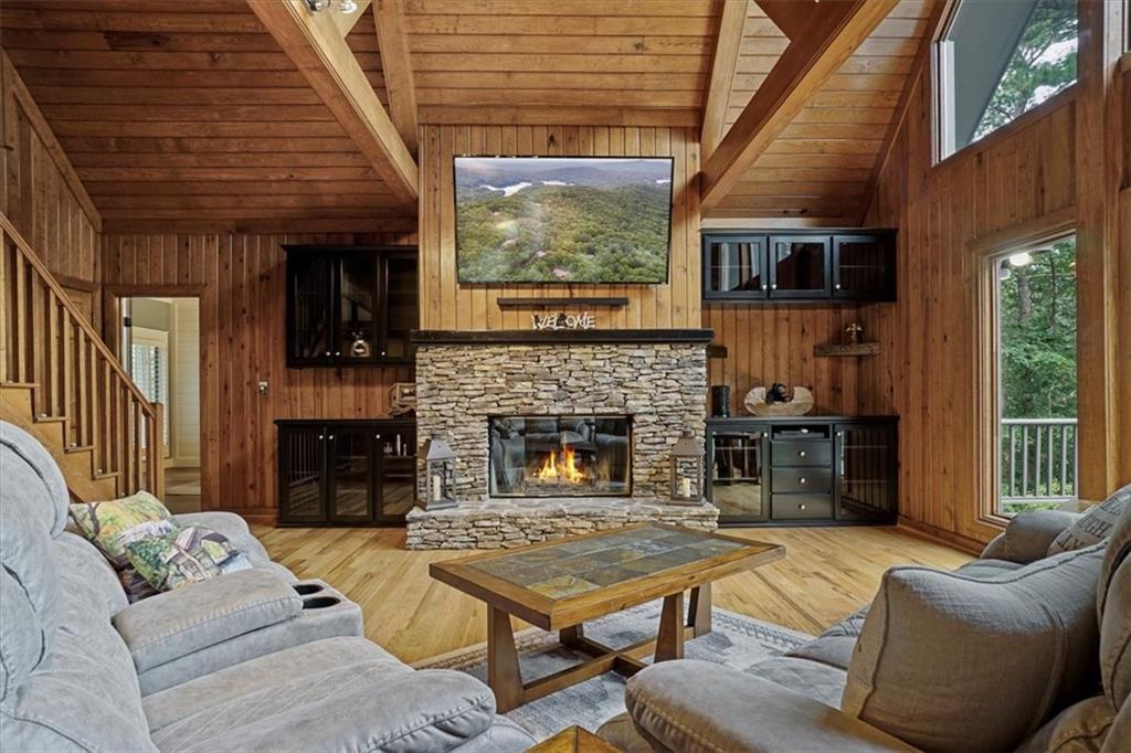 188 Tea Berry Lane Jasper, GA 30143 - Photo 11 of 68 a living room with furniture and a fireplace