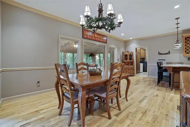 a kitchen with granite countertop a sink and cabinets