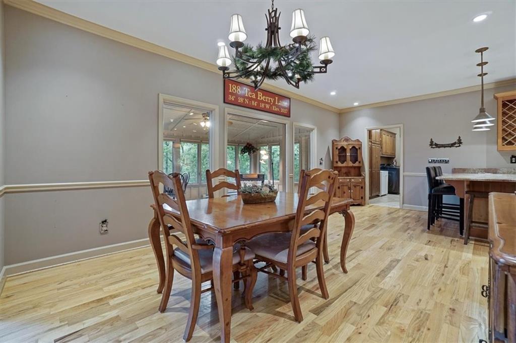 188 Tea Berry Lane Jasper, GA 30143 - Photo 13 of 68 a view of a dining room with furniture and wooden floor