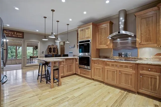 a view of roof deck with furniture