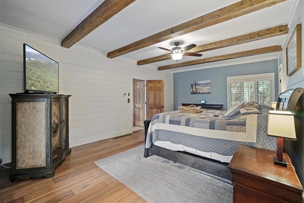 188 Tea Berry Lane Jasper, GA 30143 - Photo 26 of 68 a living room with furniture and a flat screen tv
