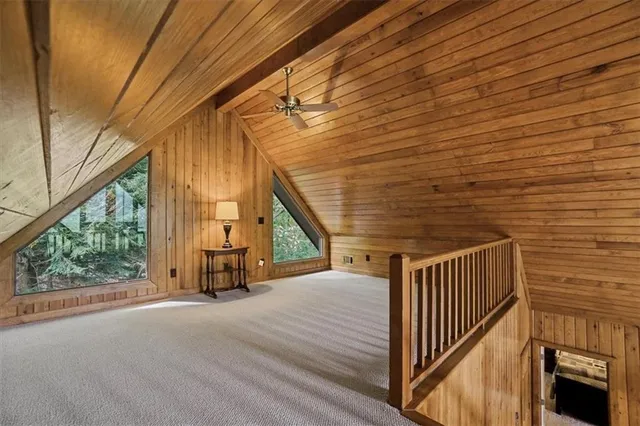 a balcony with wooden floor