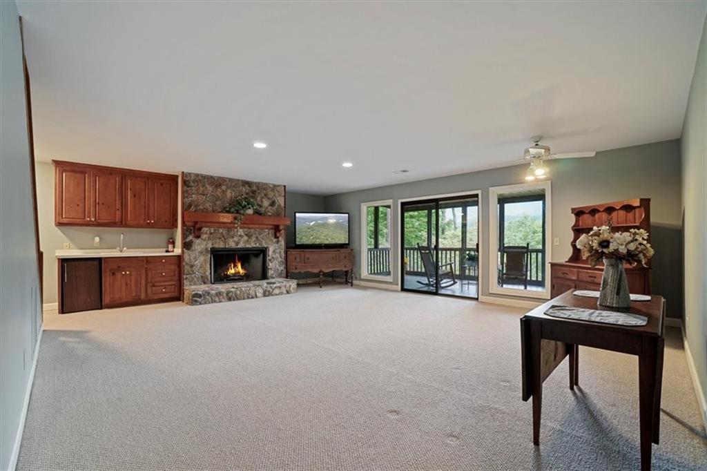 188 Tea Berry Lane Jasper, GA 30143 - Photo 39 of 68 a living room with furniture and a fireplace