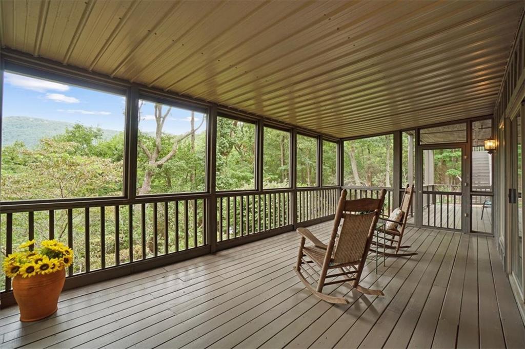 188 Tea Berry Lane Jasper, GA 30143 - Photo 40 of 68 a view of a balcony with wooden floor