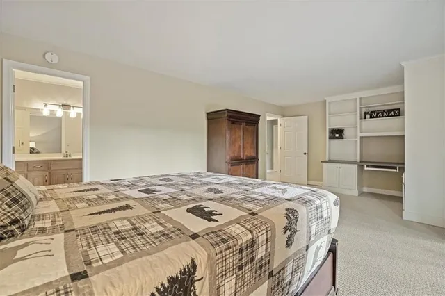 a view of a field with a mountain in the background