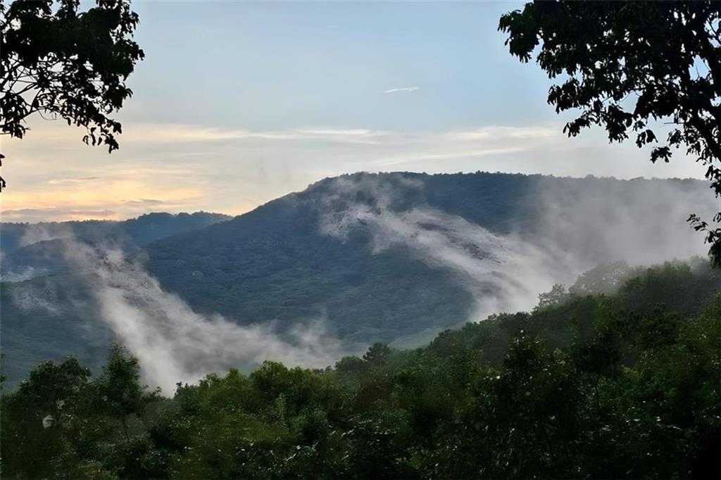 188 Tea Berry Lane Jasper, GA 30143 - Photo 59 of 68 a view of ocean with mountains in the background