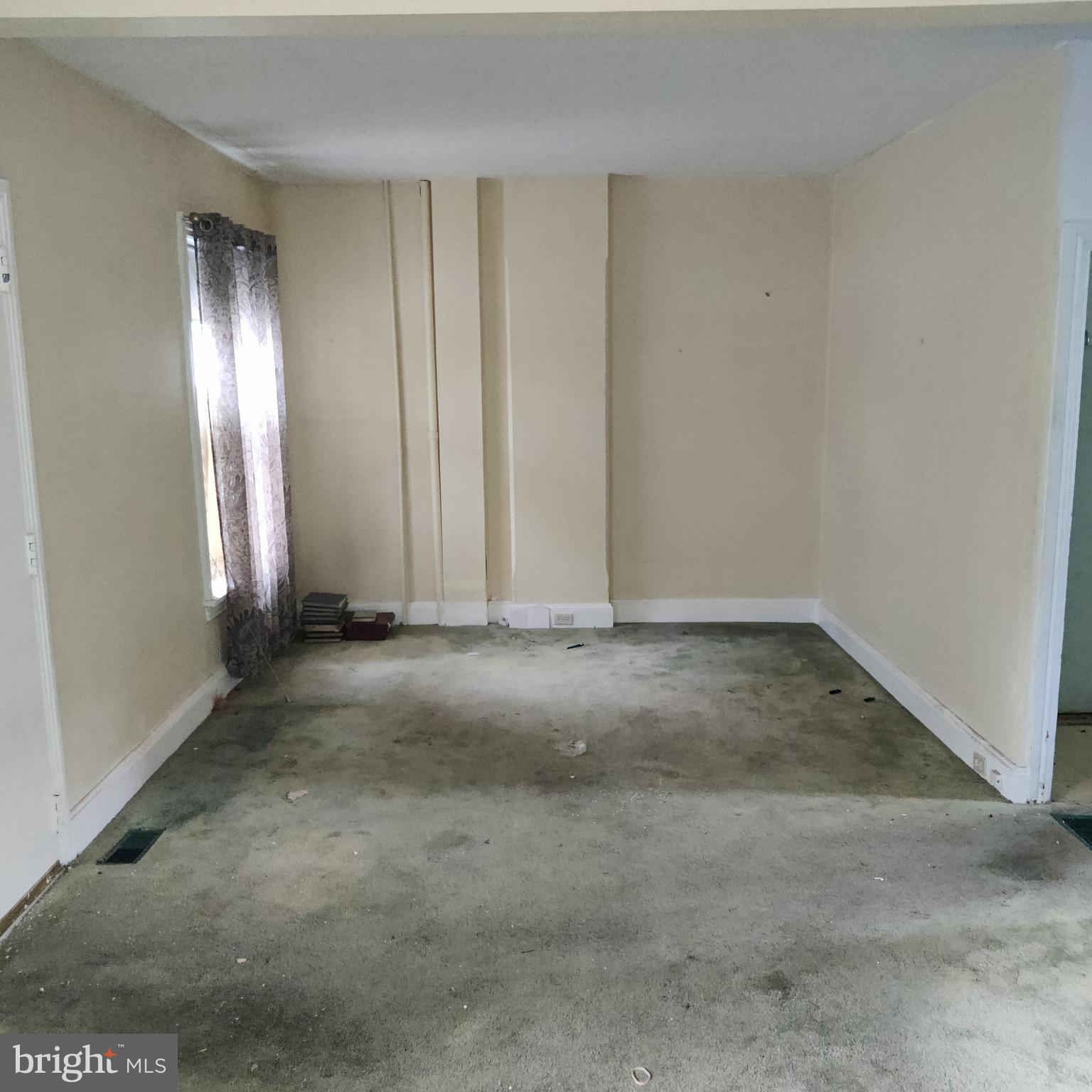 an empty room with an entryway