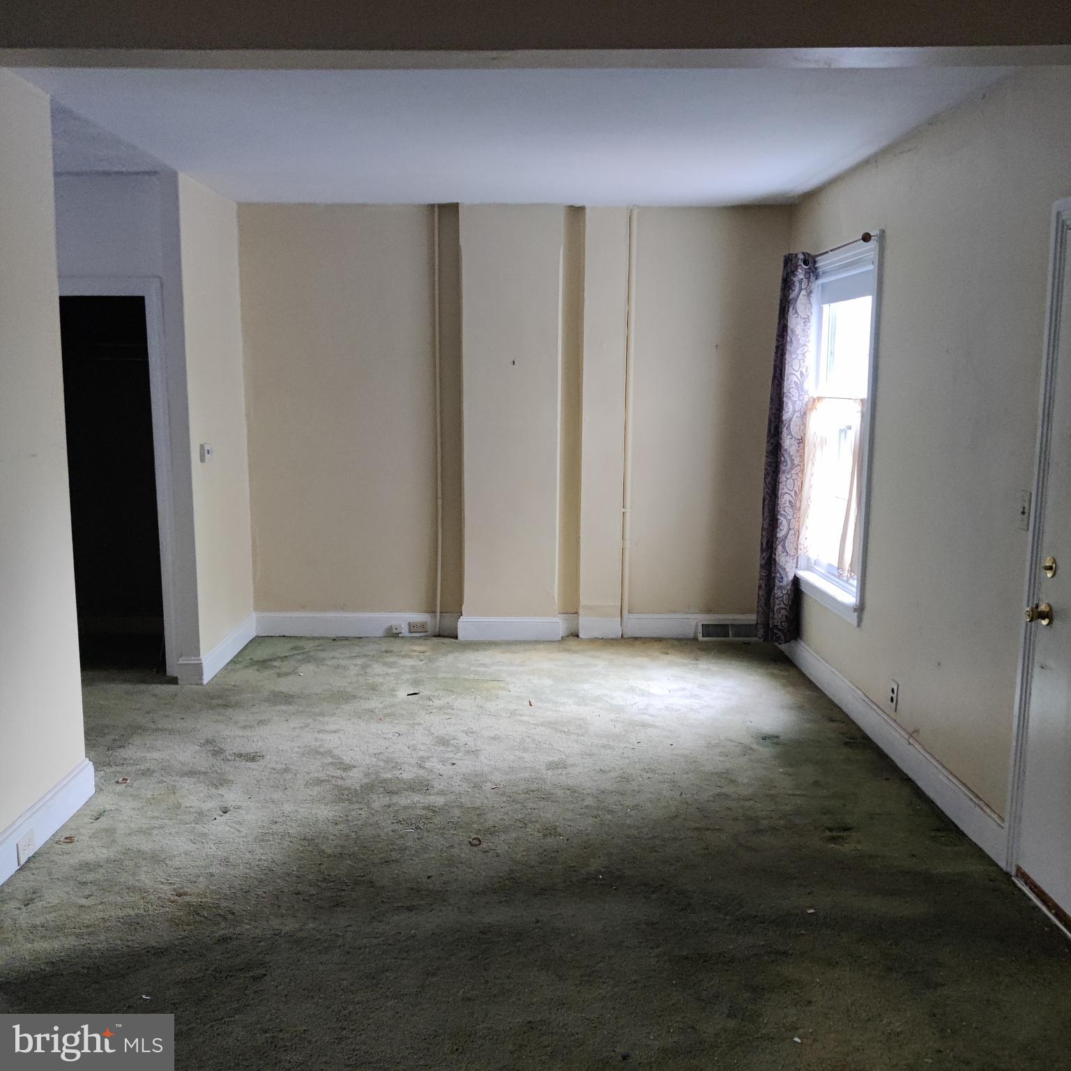 209 Sharpless Street West Chester, PA 19382 - Photo 2 of 12 an empty room with windows