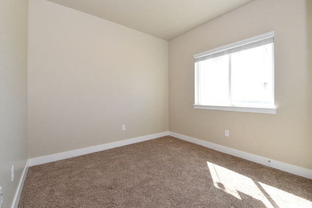 241 West Ridge Road Saratoga Springs, UT 84045 - Photo 15 of 21 Room featuring wall-to-wall carpeting, neutral wall paint, and white trim