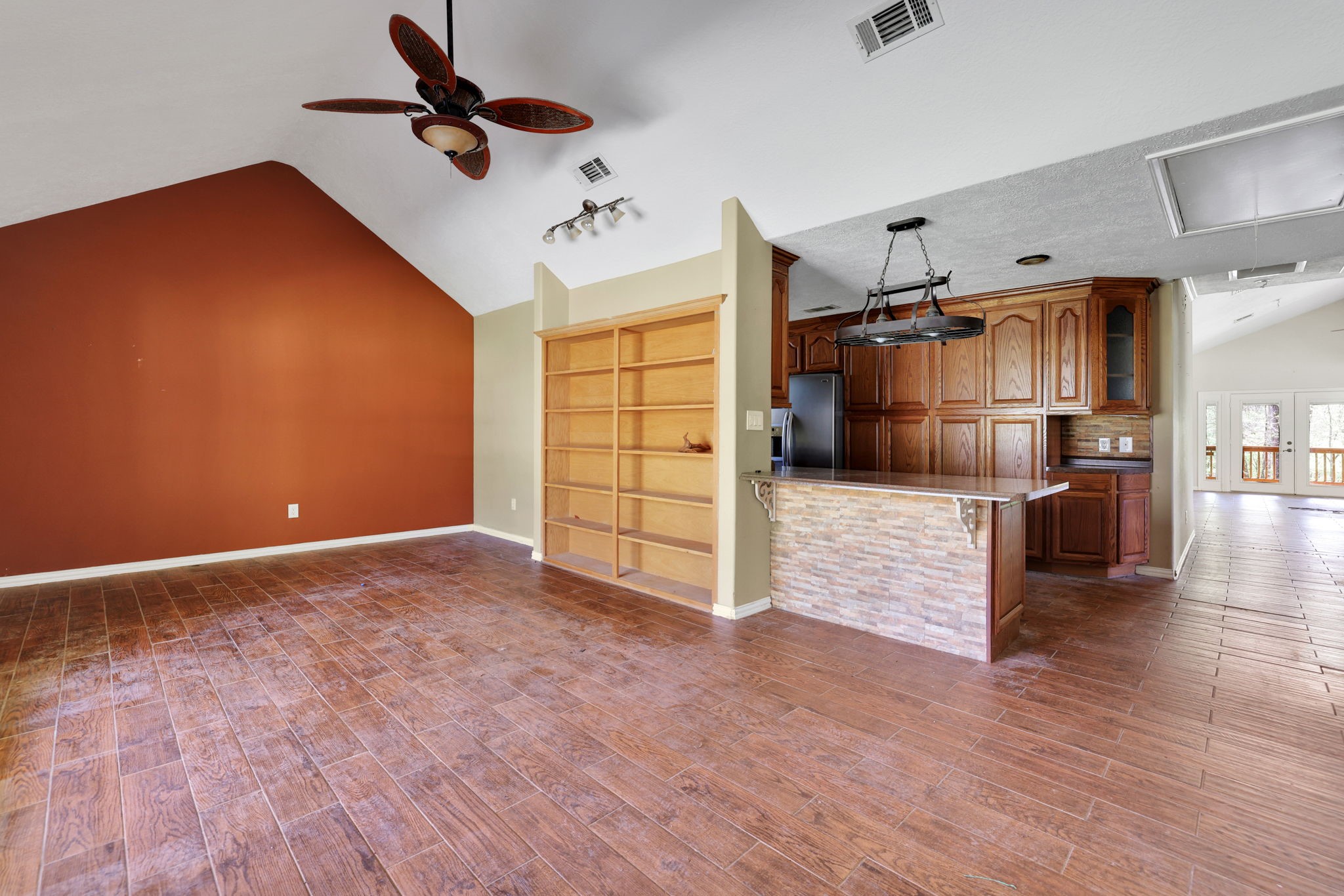 250 Critter Creek Road Coldspring, TX 77331 - Photo 29 of 48 Cabin 1 - Dining room open to kitchen