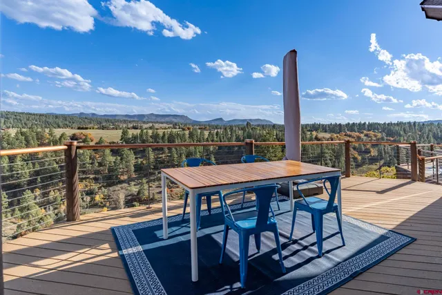 a view of a terrace with furniture